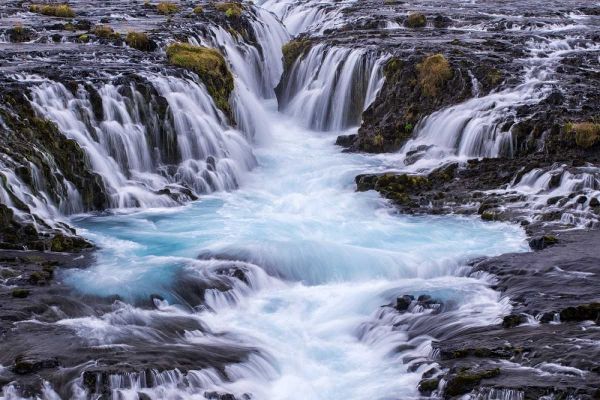 Iceland, Bruarfoss Waterfalls flow into river